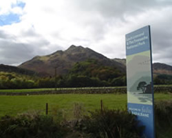 Sign to the entrance of Loch Lomond National park